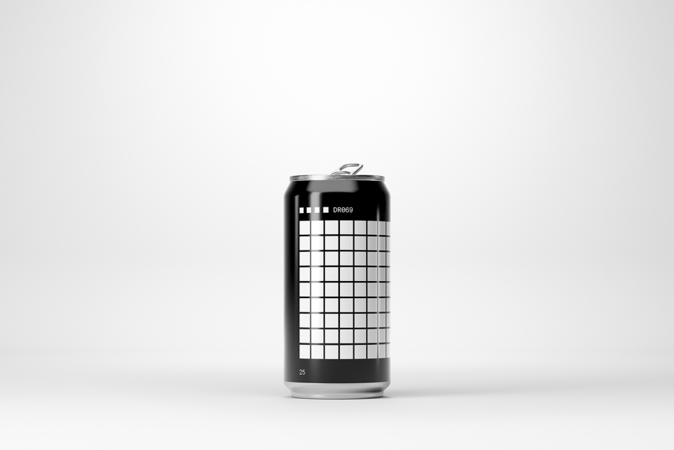 Black soda can with grid pattern design labeled DR069 on white backdrop