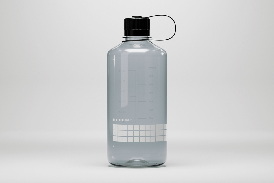 Clear plastic water bottle with black cap, measurement markings on side