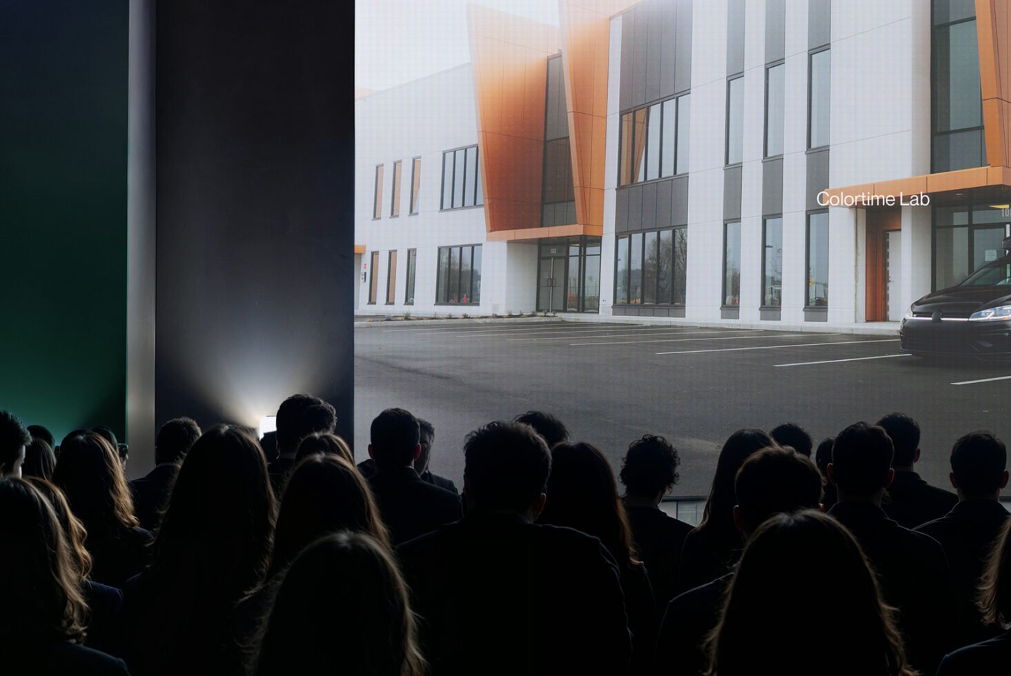 Audience watching a building presentation in a dark room. White and orange modern architecture. Ideal for mockups and templates. Designers marketplace.