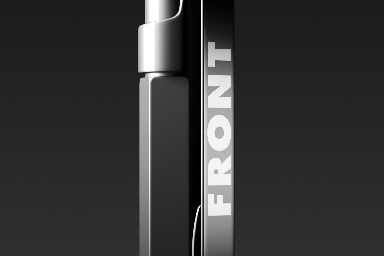 Close-up of a sleek black and silver aerosol spray can design against a dark background with the word FRONT on its side; ideal for product mockups.