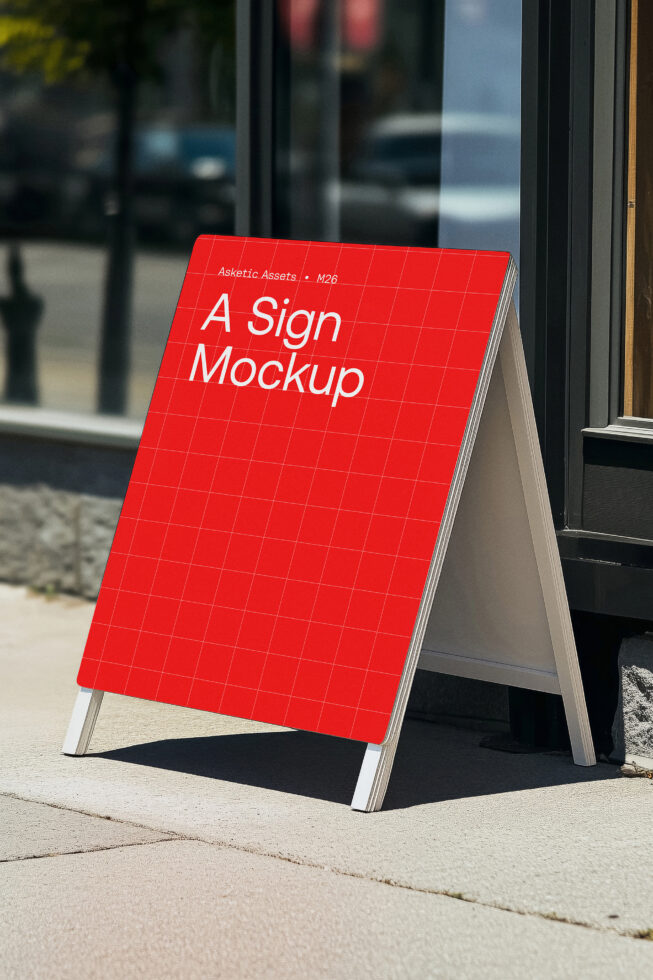 Red outdoor A-frame sign mockup on sidewalk perfect for showcasing branding design. Ideal for designers needing realistic presentation templates.