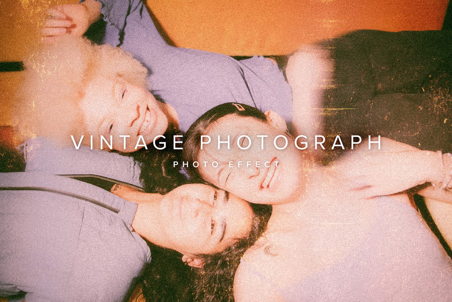 Vintage photograph effect with three people smiling, laying down. Sepia tones and grainy texture create a retro feel. Ideal for mockups and graphic design.