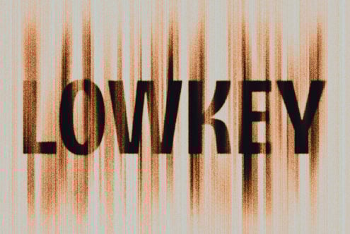 Abstract digital design featuring the word LOWKEY in bold black letters with an orange vertical line texture. Ideal for graphics or typography projects.