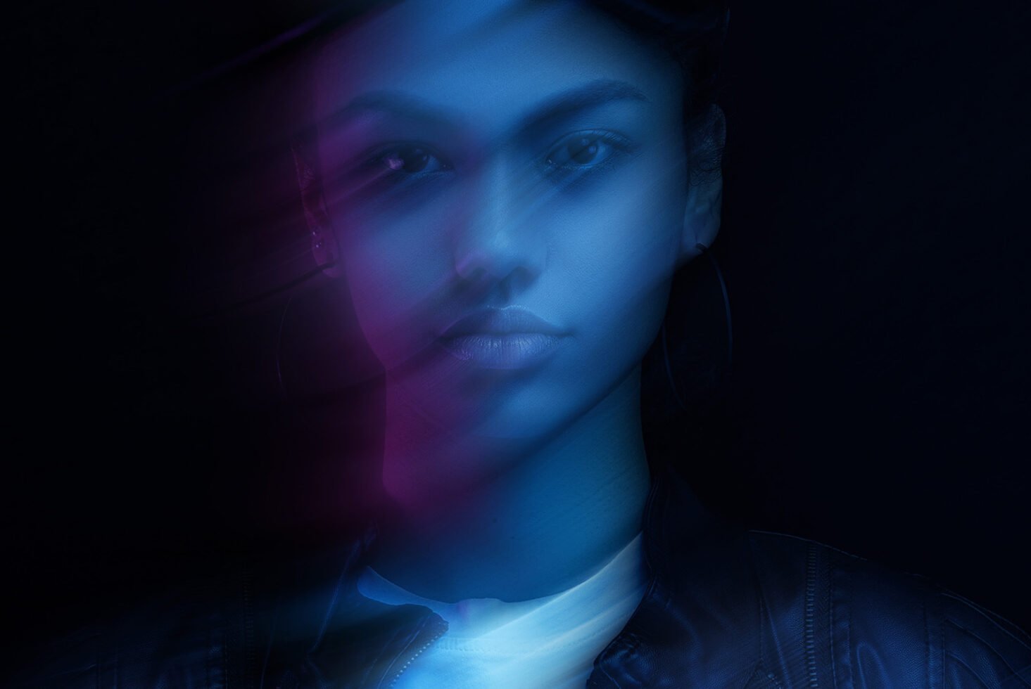 Blurred double exposure portrait with blue and purple light effects ideal for graphic design projects digital art inspiration creative templates