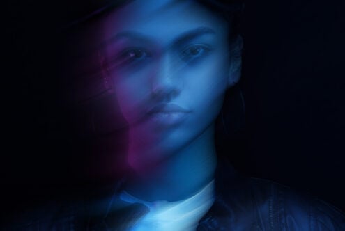 Blurred double exposure portrait with blue and purple light effects ideal for graphic design projects digital art inspiration creative templates
