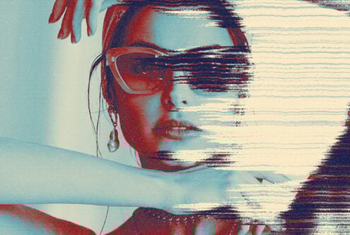 Retro glitch effect portrait with blue and red hues. Distorted vintage style suitable for digital graphic design, art projects, photo editing templates.