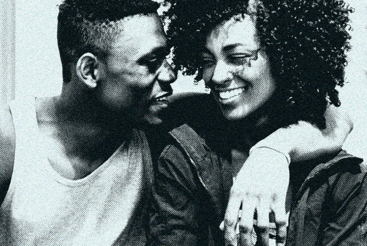 Halftone image of a smiling couple embracing, suitable for graphics or templates. Retro style, perfect for designers seeking vintage textures.