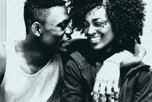 Halftone image of a smiling couple embracing, suitable for graphics or templates. Retro style, perfect for designers seeking vintage textures.