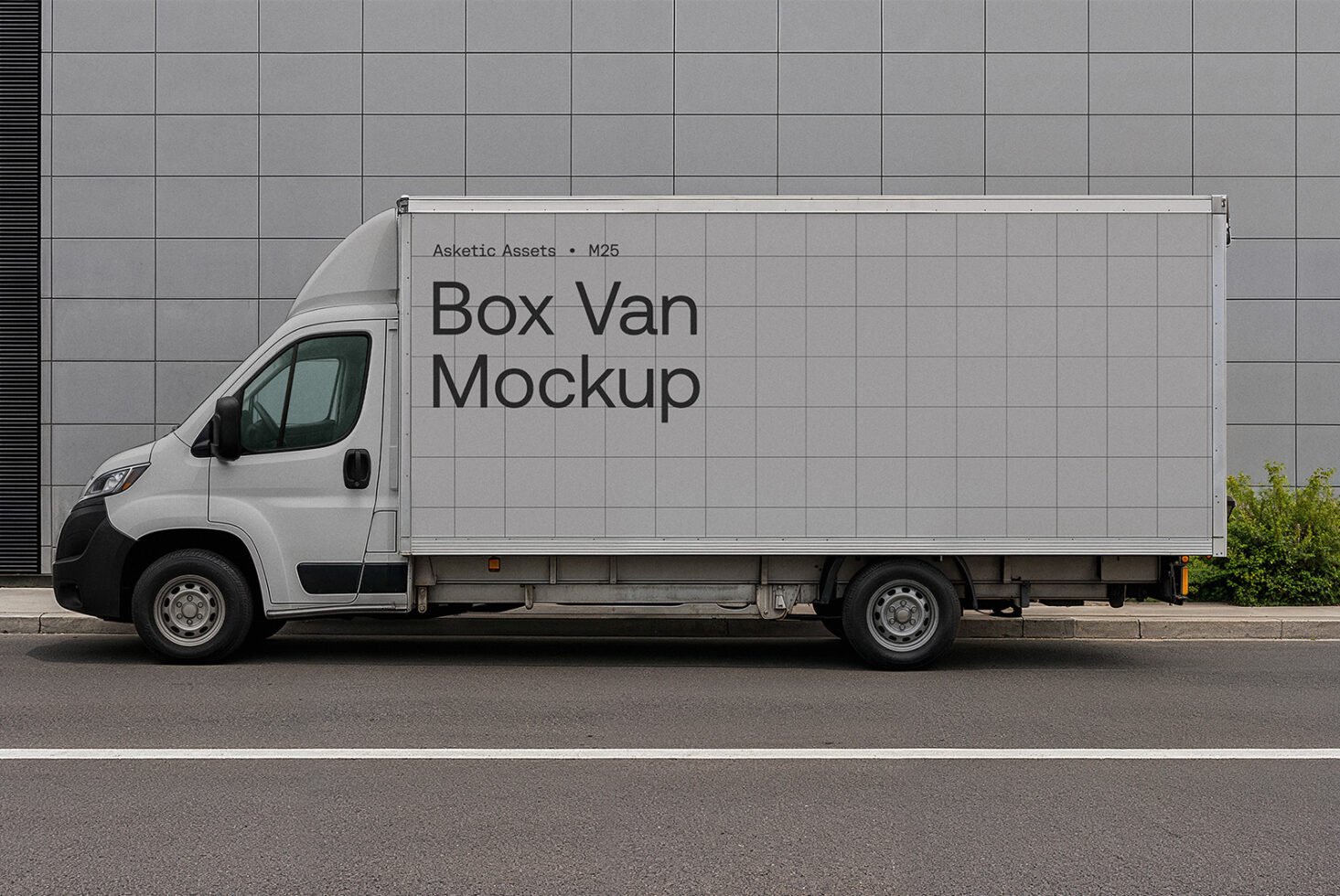 Side view of grey box van mockup parked by a modern building. Ideal for branding design, vehicle graphics, and advertising templates.
