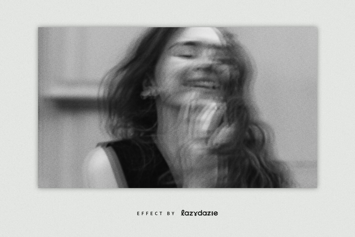 Blurry black and white portrait of woman laughing with motion blur effect perfect for creative design projects photo editing templates and graphics.