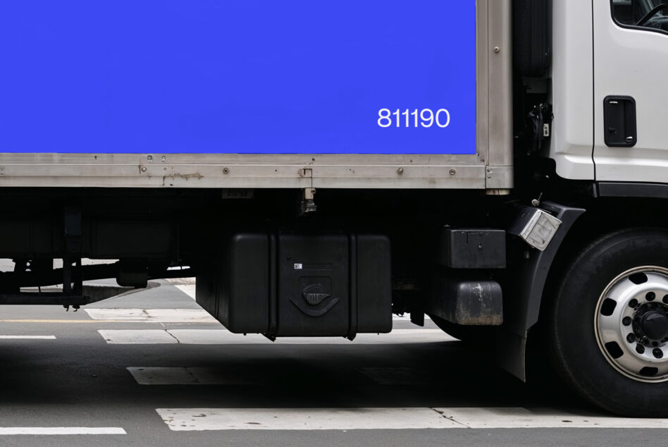 Bright blue truck side panel mockup with ID number, street view