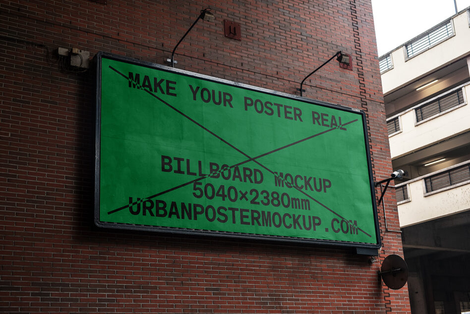 Bright green billboard on brick building showing editable poster mockup template