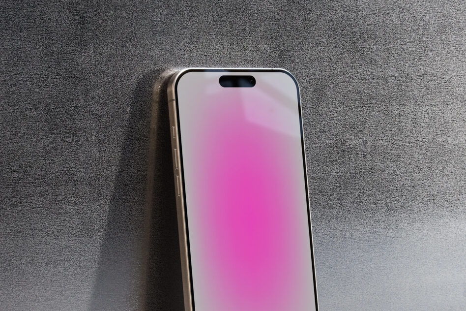 Phone mockup with pink gradient screen on textured gray background