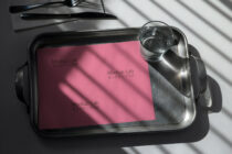 Metal tray with pink background showing Mockup Lab text