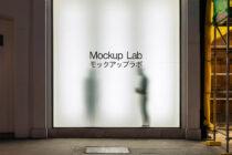 Frosted glass storefront window with blurred silhouettes displaying Mockup Lab text