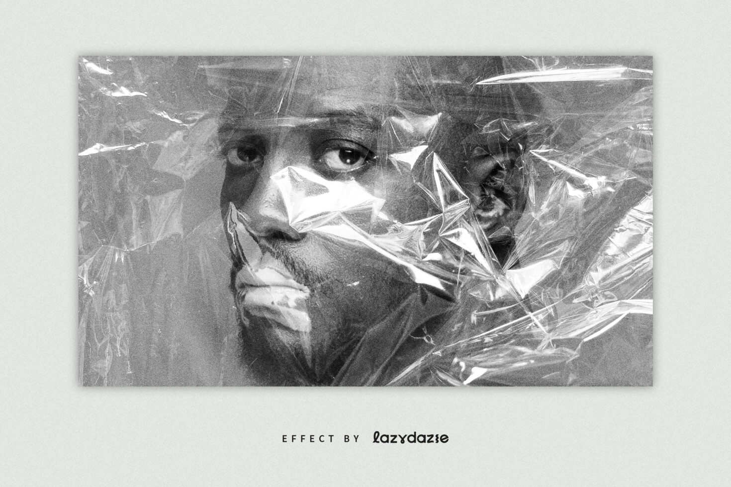 Black and white portrait with shattered plastic wrap overlay effect