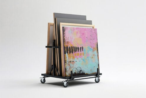 Mobile display rack with stacked frames showing abstract colorful artwork mockup