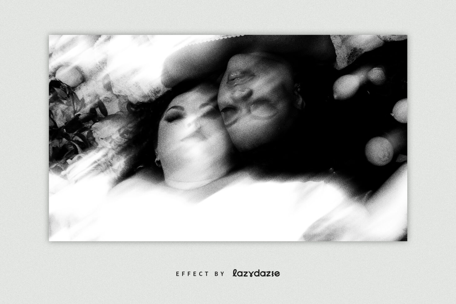 Couple in bed grainy black white intimate portrait with soft focus