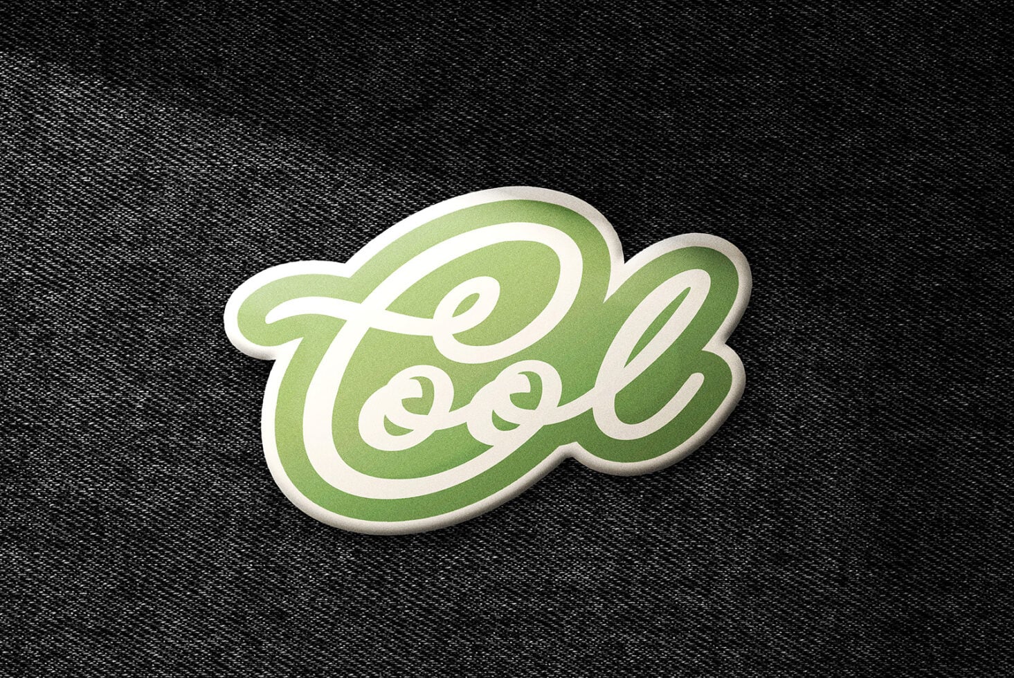 Green script sticker with cursive Cool text on textured dark background