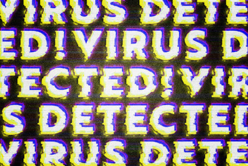 Glitchy digital text reading Virus Detected in bold yellow and purple with a retro screen effect for designers. Keywords: graphics, digital art, glitch, design.