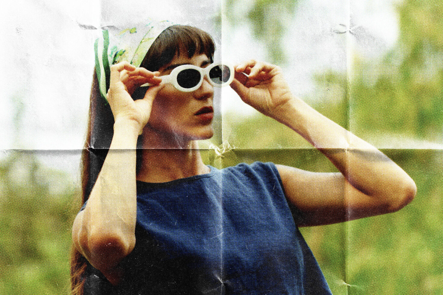 Y2K girl in white oval sunglasses holding them up outdoors, retro halftone print
