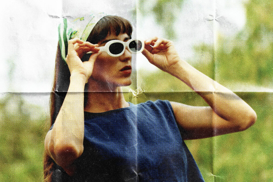 Y2K girl in white oval sunglasses holding them up outdoors, retro halftone print
