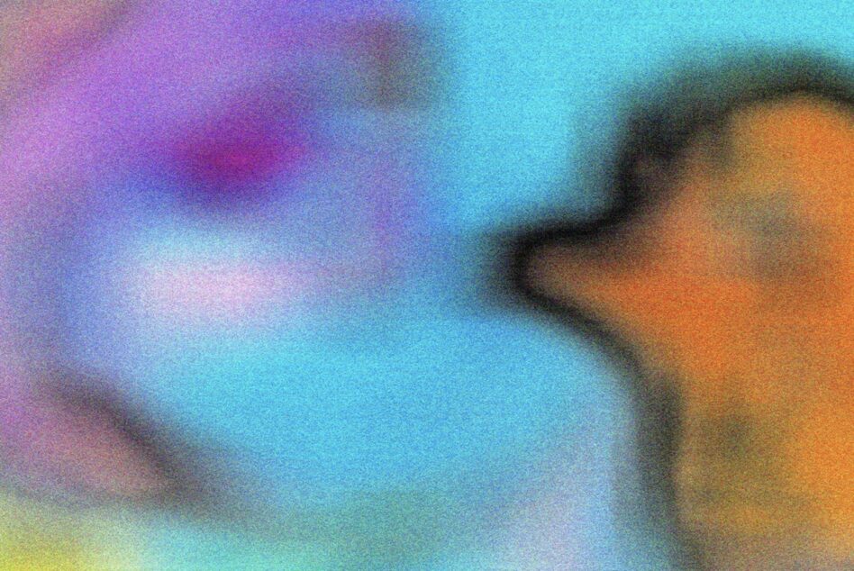 Blurry gradient shift from magenta to cyan to orange with grainy texture