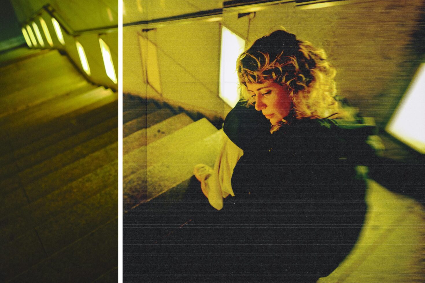 Person in dark hoodie under yellow neon lights looking downward pensively