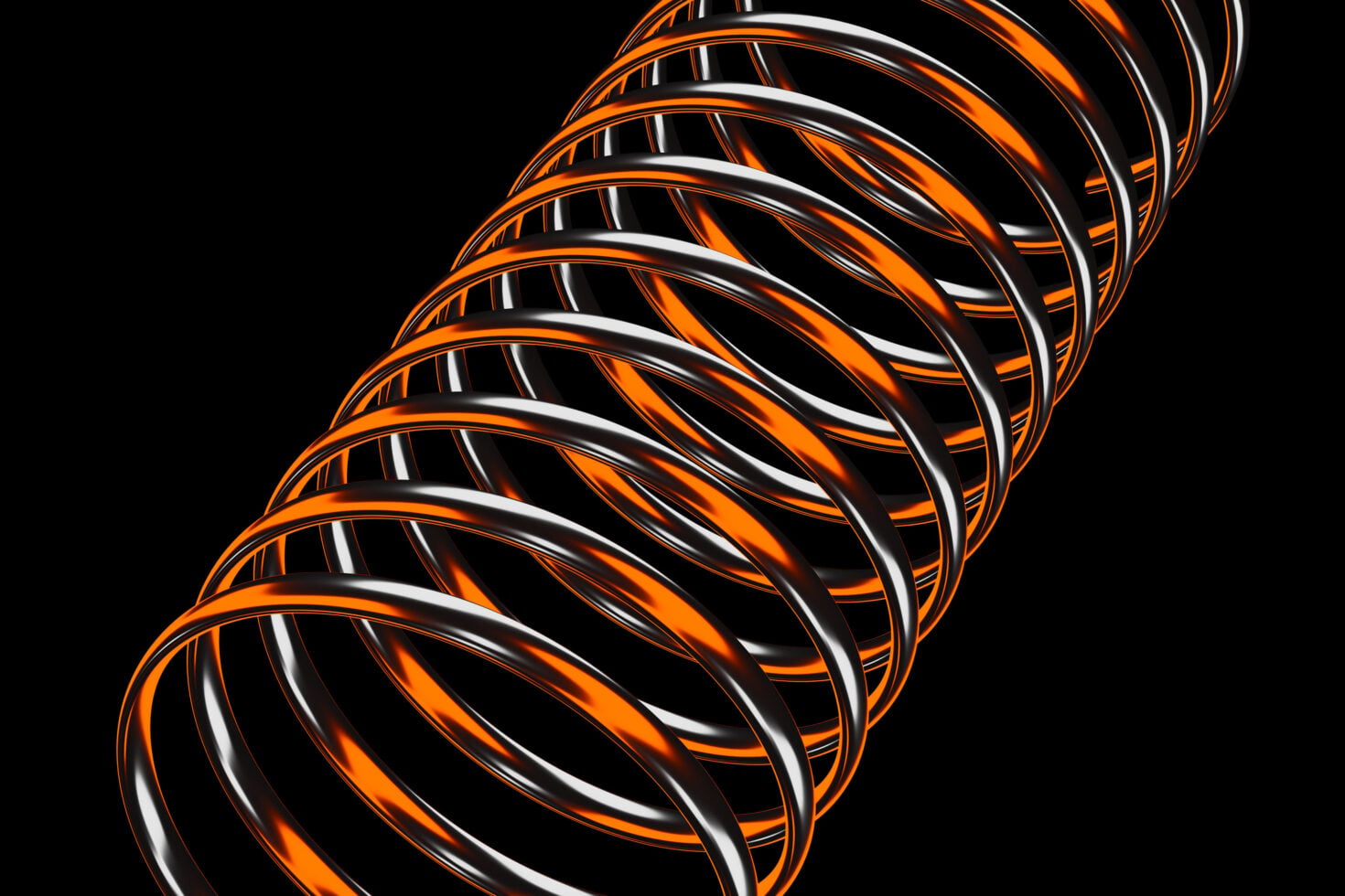 Stacked tube rings with orange white black stripes on dark background