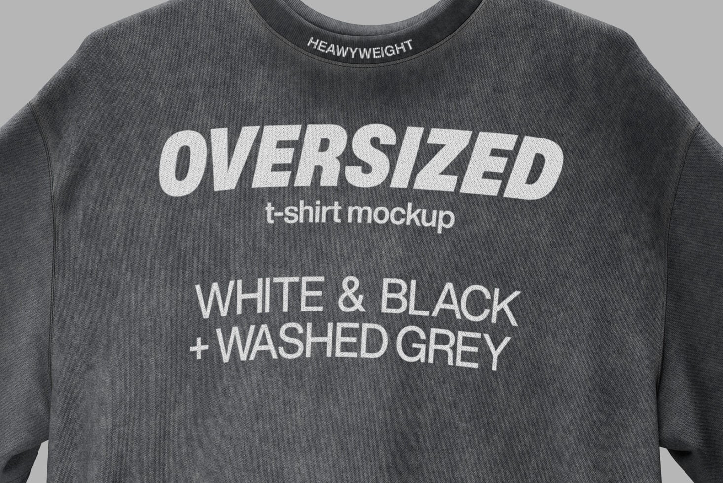 Oversized charcoal sweatshirt with white text on metal hanger