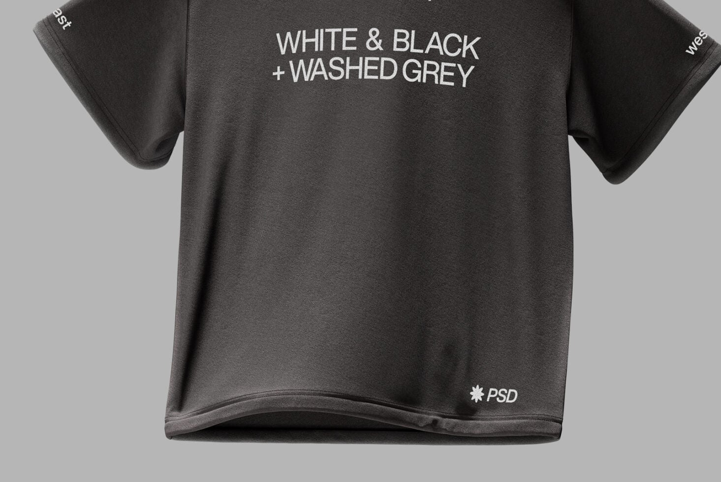 Charcoal t-shirt with white text printed on chest against neutral backdrop
