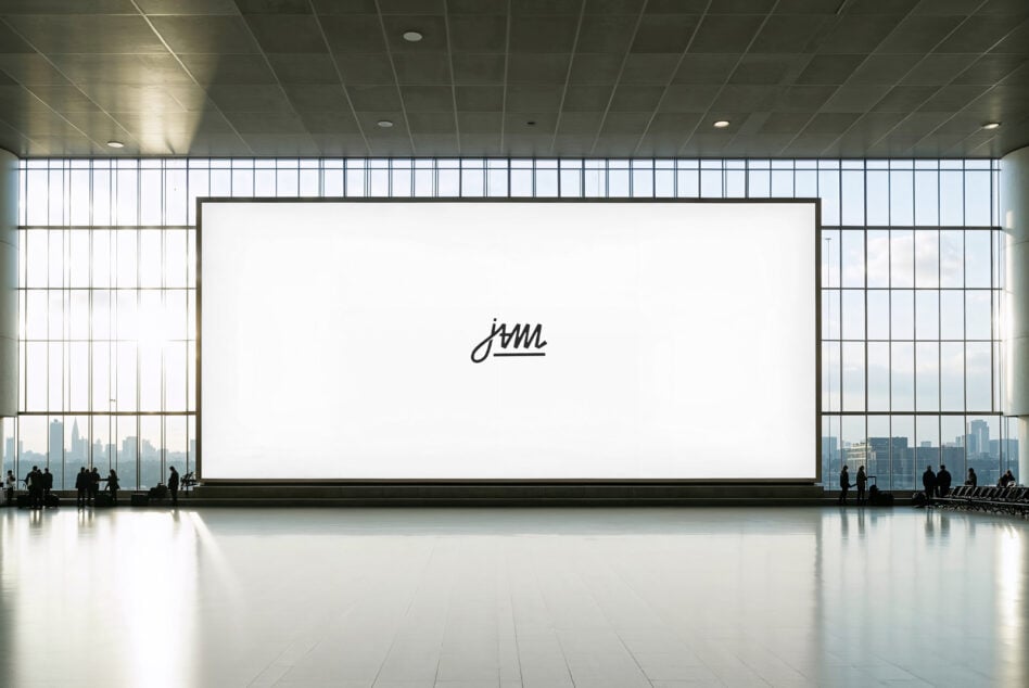 Massive blank gallery wall with tiny centered logo, minimalist museum setting