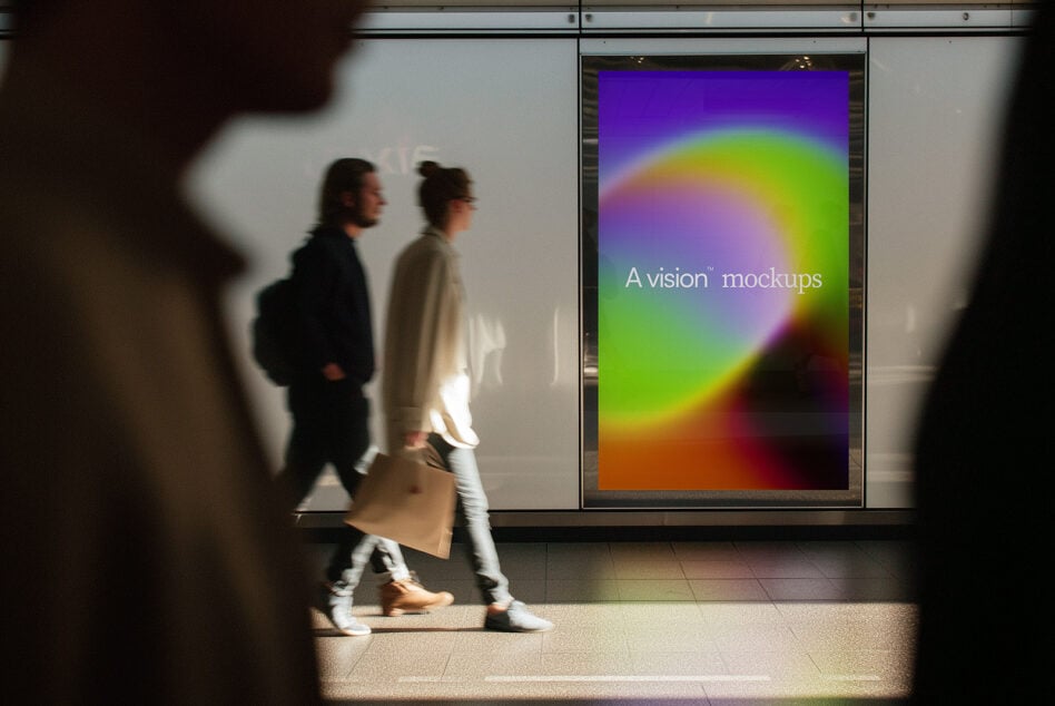 Colorful gradient display on mall window with two people walking past