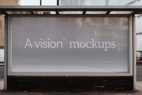 Large storefront window with A vision mockups text in white sans serif type