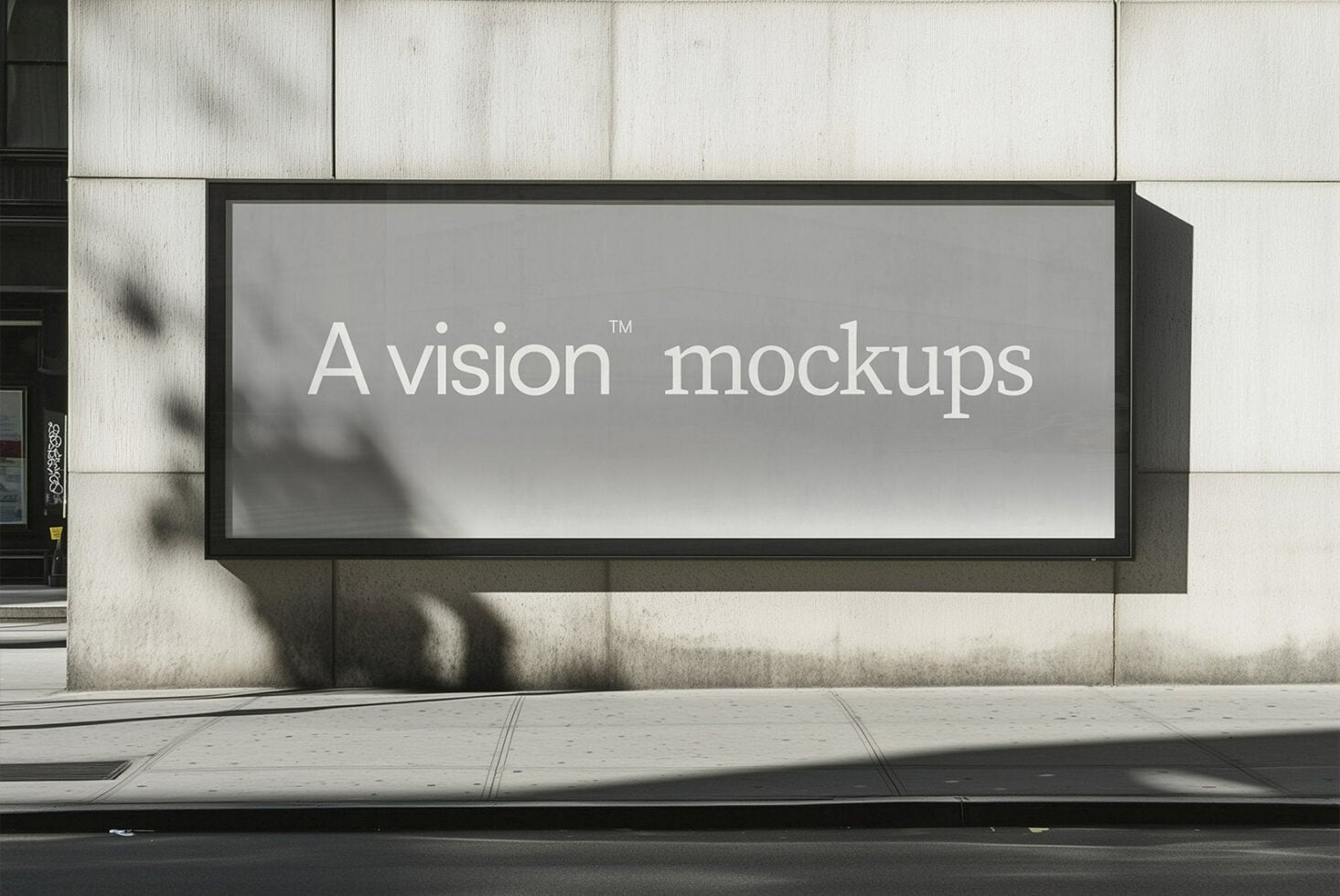 Horizontal billboard with black frame on concrete wall showing white text