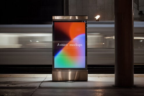 Vertical street kiosk with glowing gradient display showing colorful orange to cyan blend