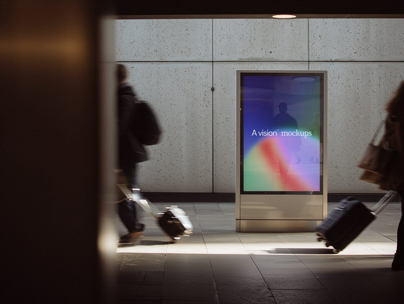 Vibrant gradient screen on subway kiosk with commuters passing through