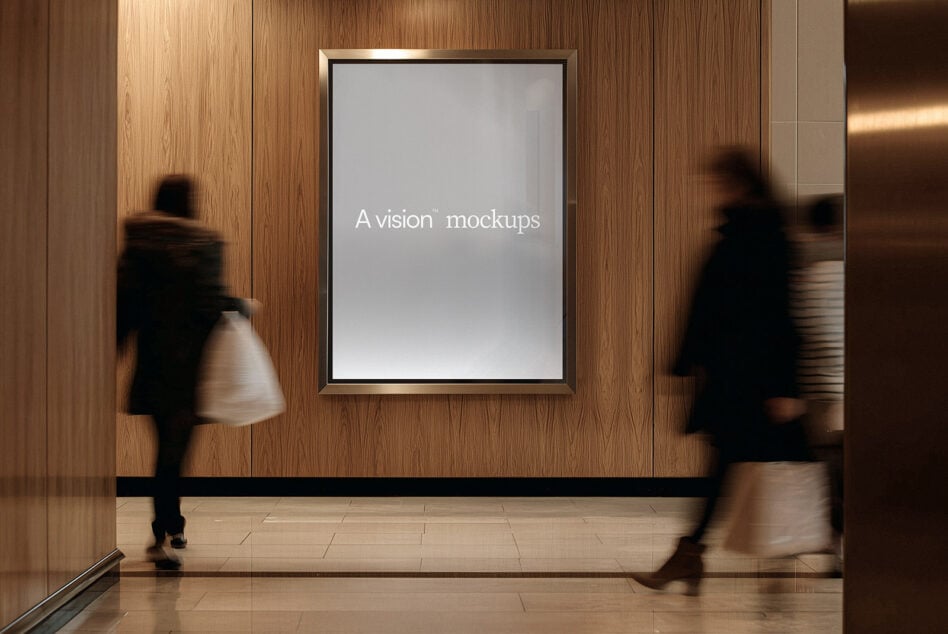 Framed portrait display on wood wall with people walking past in blurred motion