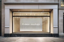 Minimal storefront with white signage display on cream interior backdrop