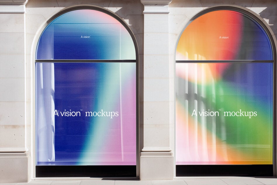 Dual arched windows showing colorful gradient displays in storefront setting