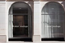Two matching arched windows with dark interior glass storefront mockup