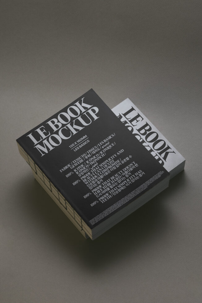 Black book mockup with white spine label shown at angle with shadow