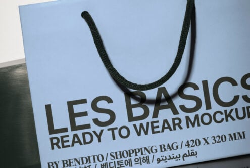 Blue shopping bag mockup with rope handles showing front branding text