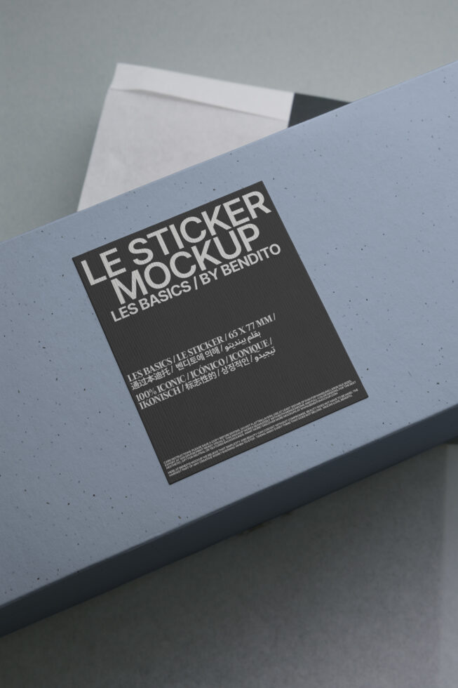 Dark sticker mockup on blue textured surface with white typography layout