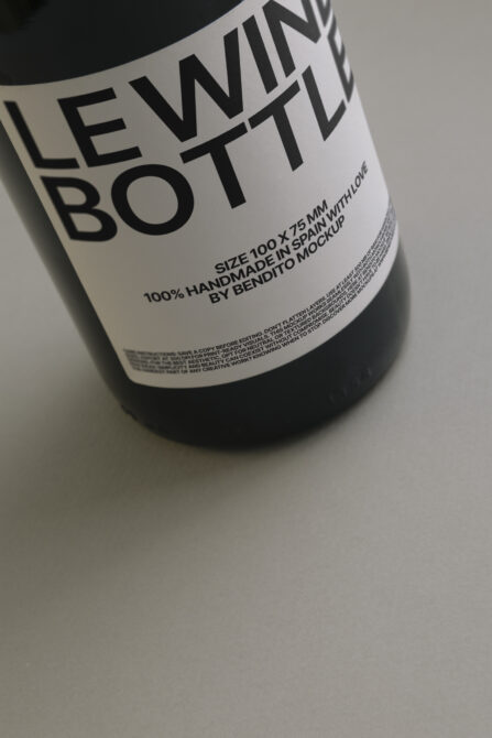 Wine bottle label mockup on cream background showing type details