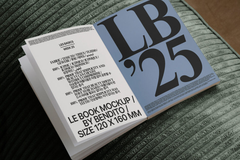 Open book mockup on sage textile with periwinkle cover showing large LB numbers