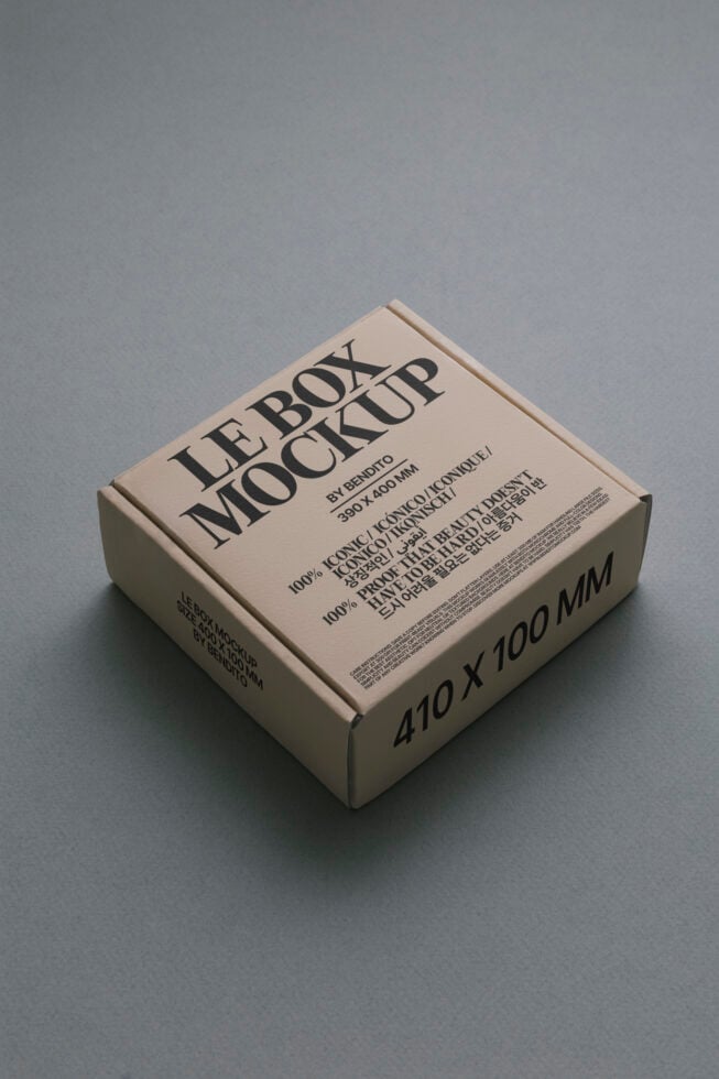 Cream box mockup with black typography on clean studio background