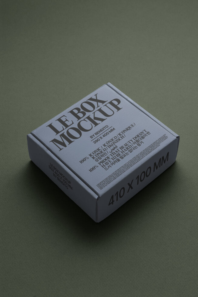 Square box mockup in soft blue sitting on neutral green surface