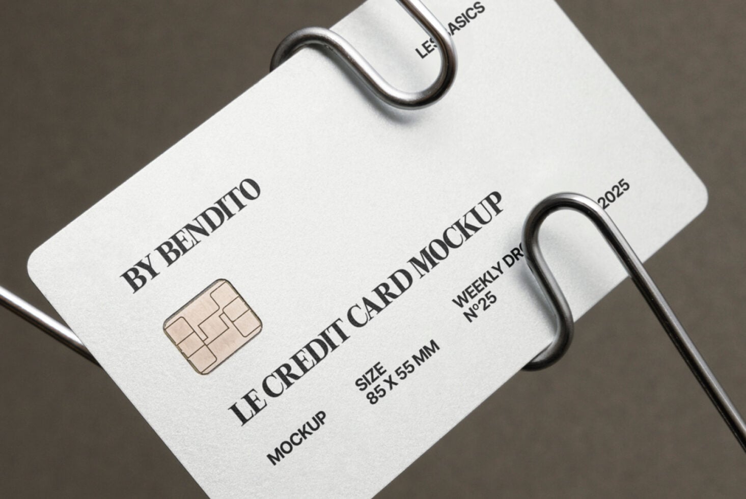 Cream colored card mockup on wire display with minimalist styling