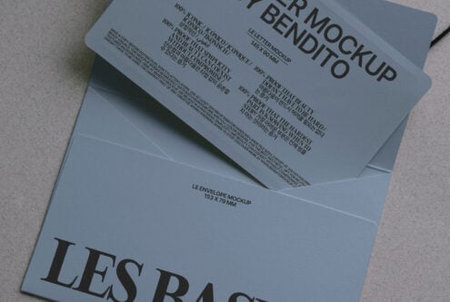 Blue envelope mockup with letter inside displayed at angle on blue folder